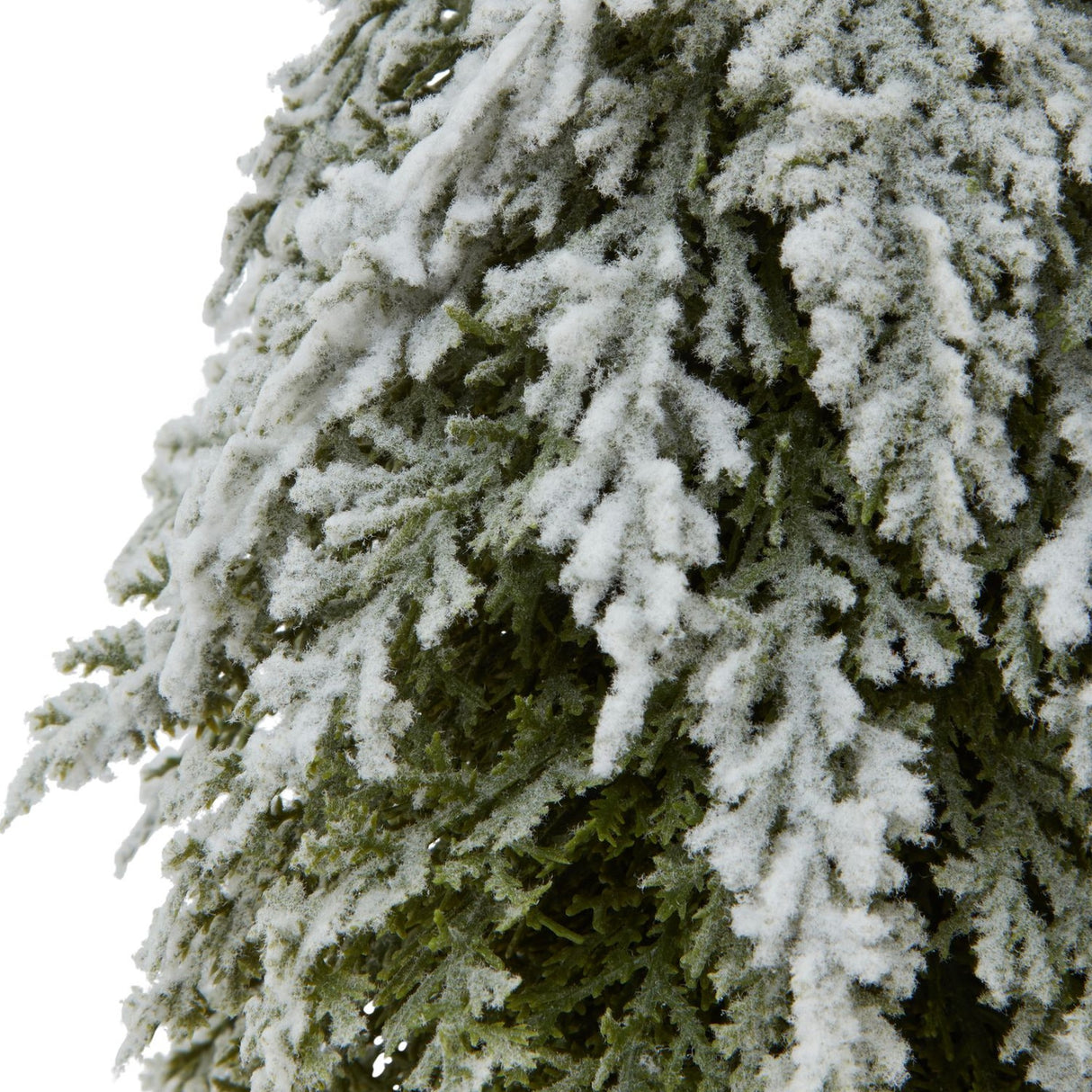 Close-up of the Hill Interiors Small Snowy Fir Tree, showing frosted green plastic branches dusted with snow against a plain white background.