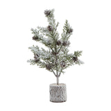 Hill Interiors Small Snowy Fir Tree with pinecones and faux snow-dusted branches set in a brown wood-effect log base, shown on a white background.