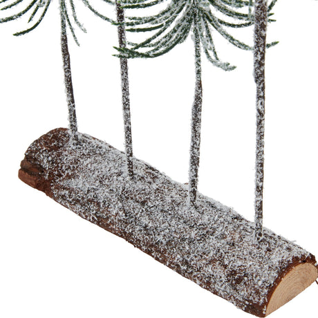 Close-up of the Hill Interiors Medium Snowy Spindle Tree Quad base, showing slender frosted trunks set into a snow-dusted brown wooden log.
