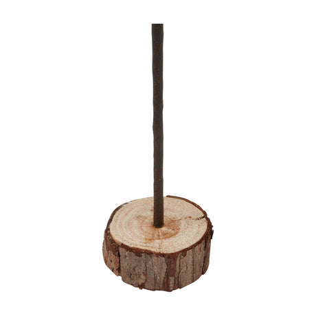 Close-up of the brown wood log base and slim trunk of the Hill Interiors Large Snowy Spindle Tree Christmas decoration on a white background.