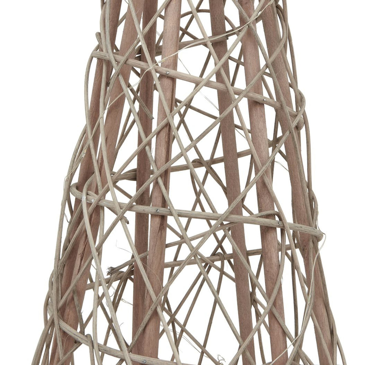 Close-up of the Hill Interiors Large LED Wicker Christmas Tree in brown, showing the tapered woven frame with vertical staves and crisscrossing wicker strands.