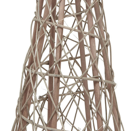 Close-up of the Hill Interiors Large LED Wicker Christmas Tree in brown, showing the tapered woven frame with vertical staves and crisscrossing wicker strands.