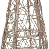 Close-up of the Hill Interiors LED wicker Christmas tree showing its brown woven conical form with open lattice weave and internal LED string lights.