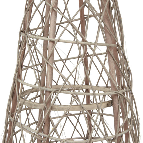 Close-up of the Hill Interiors LED wicker Christmas tree showing its brown woven conical form with open lattice weave and internal LED string lights.
