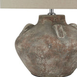 Close-up of the Hill Interiors Lumbriden Lekanis Table Lamp showing its rounded brown glazed ceramic urn body with small handle detail and linen shade base.