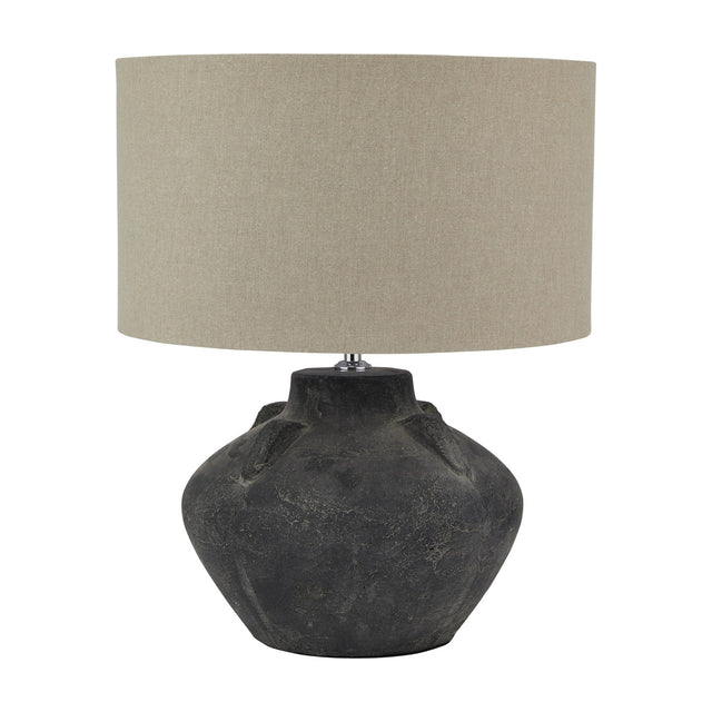 Hill Interiors Ferranock Lekanis table lamp with a rounded grey ceramic base and oatmeal linen drum shade, shown on a plain white background.