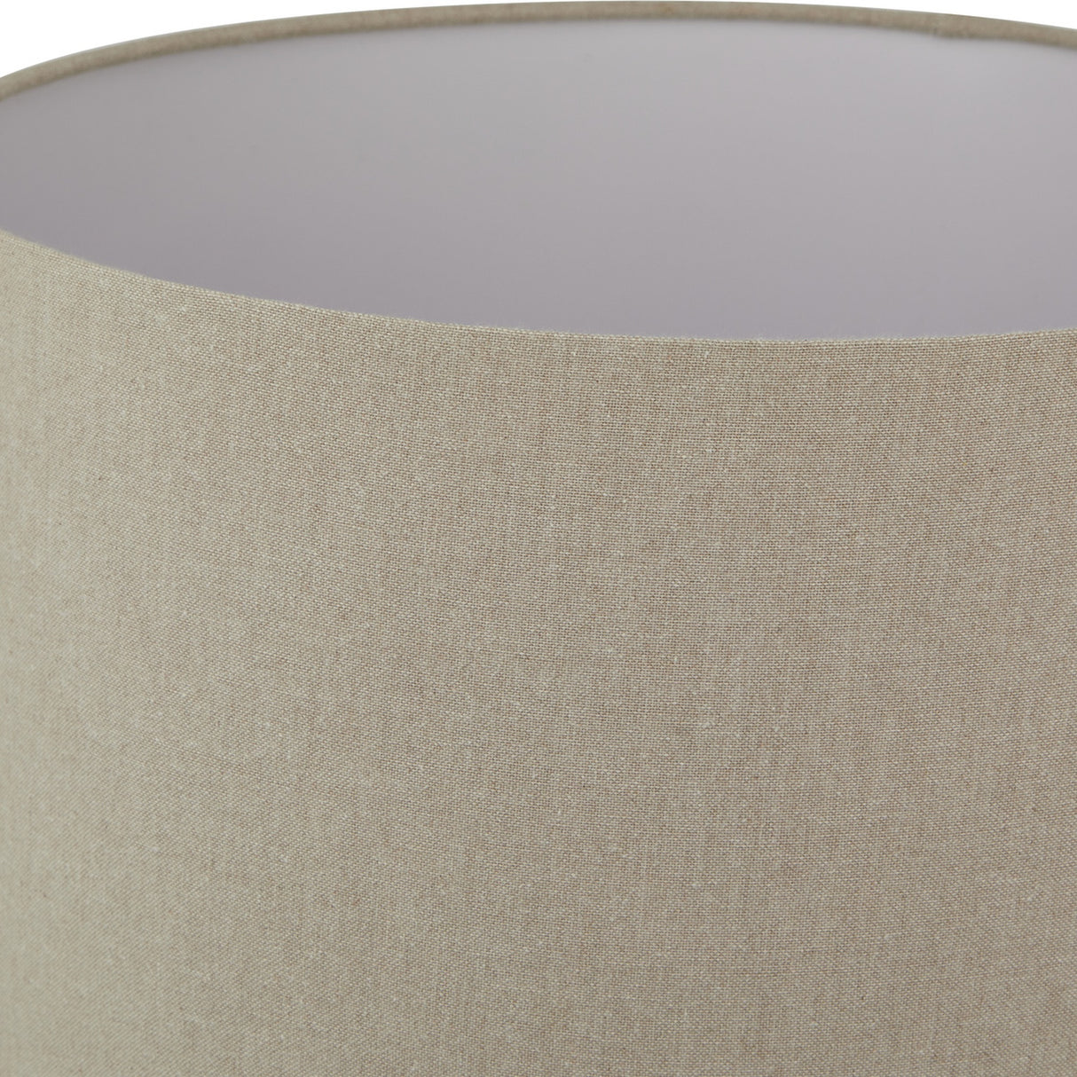 Close-up of the Hill Interiors Ferranock Lekanis table lamp shade in oatmeal linen-look fabric with a pale grey lining.