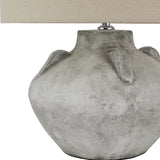 Hill Interiors Elvessa Stone Lekanis table lamp with beige ceramic rounded base, small handle detail, and linen drum shade.