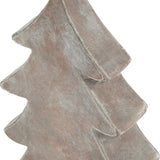 Close-up of the Hill Interiors Ceramic Medium Christmas Tree in brown, showing the tiered fir silhouette and matt, textured earthy finish.