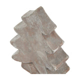 Close-up of the Hill Interiors Small Ceramic Christmas Tree in brown, showing its tiered fir silhouette and textured matt finish against a white background.