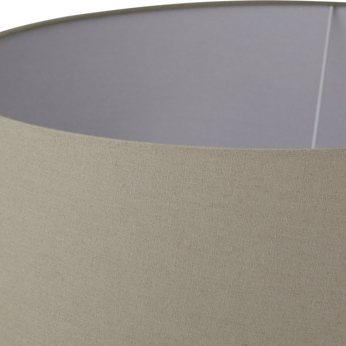 Close-up of the Hill Interiors Elvessa ceramic table lamp shade, showing beige linen-effect fabric with a pale interior lining.