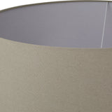 Close-up of the Hill Interiors Elvessa ceramic table lamp shade, showing beige linen-effect fabric with a pale interior lining.