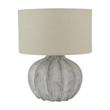 Hill Interiors Merenza fluted ceramic table lamp in antique white with a rounded base and oatmeal linen drum shade, on a plain background.