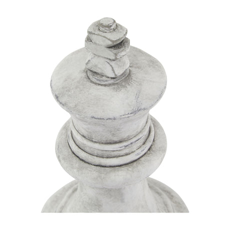 Close-up of the Hill Interiors Stone King Chess Piece ceramic ornament in beige, showing the crowned top and tapered body against a plain white background.
