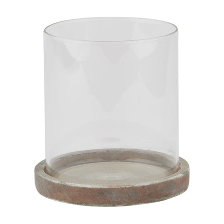 Hill Interiors Brown Ceramic Hurricane Lantern with a clear glass cylinder set on a round brown ceramic base, shown on a plain white background.