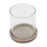 Hill Interiors brown ceramic hurricane lantern with a clear glass cylinder set into a round brown ceramic base, shown on a plain white background.