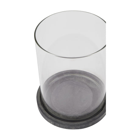 Hill Interiors Large Hurricane Lantern in grey ceramic with a clear glass cylinder set into a rounded matte base, shown on a plain white background.