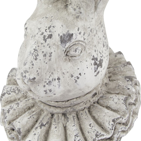 Close-up of the Hill Interiors Stone Effect Ruffle Hare Ornament in beige, showing the textured face and ruffled collar detail on the ceramic figurine.