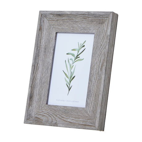 Hill Interiors grey washed wooden 4x6in photo frame with visible timber grain, shown upright on a plain white background holding a botanical print.