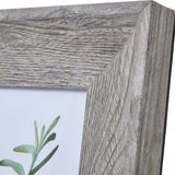 Close-up of the Hill Interiors Grey Washed Wooden Photo Frame corner, showing the mitred joint, visible timber grain and muted grey finish.