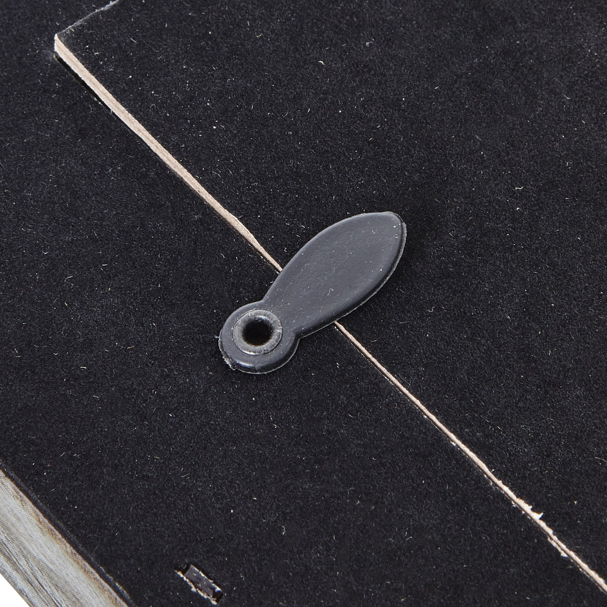 Close-up of the black felt backing and hanging tab on the Hill Interiors Grey Washed Wooden Photo Frame.
