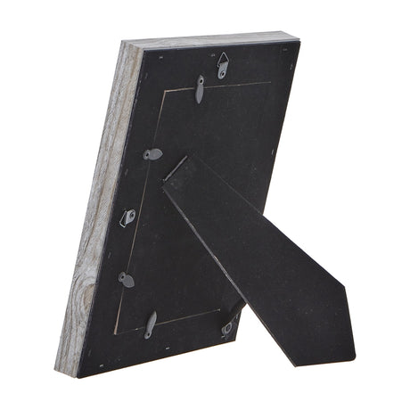 Rear view of Hill Interiors Grey Washed Wooden Photo Frame showing black backing board, metal hanging tabs and fold-out stand on a white background.