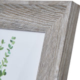 Close-up of the Hill Interiors Grey Washed Wooden Photo Frame corner, showing the moulded timber profile with visible grain and soft grey wash finish.