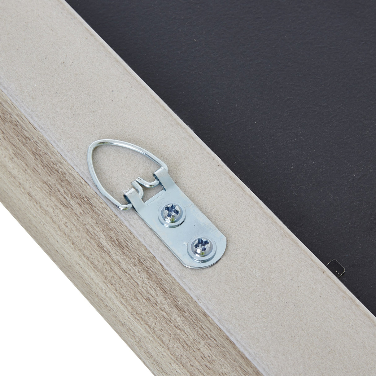 Close-up of the D-ring hanging bracket on the back of the Hill Interiors White Washed A3 Wooden Photo Frame, showing the pale timber edge.