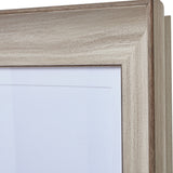 Close-up of the top corner of the Hill Interiors white washed wooden A2 picture frame, showing the brushed pale finish and visible timber grain.