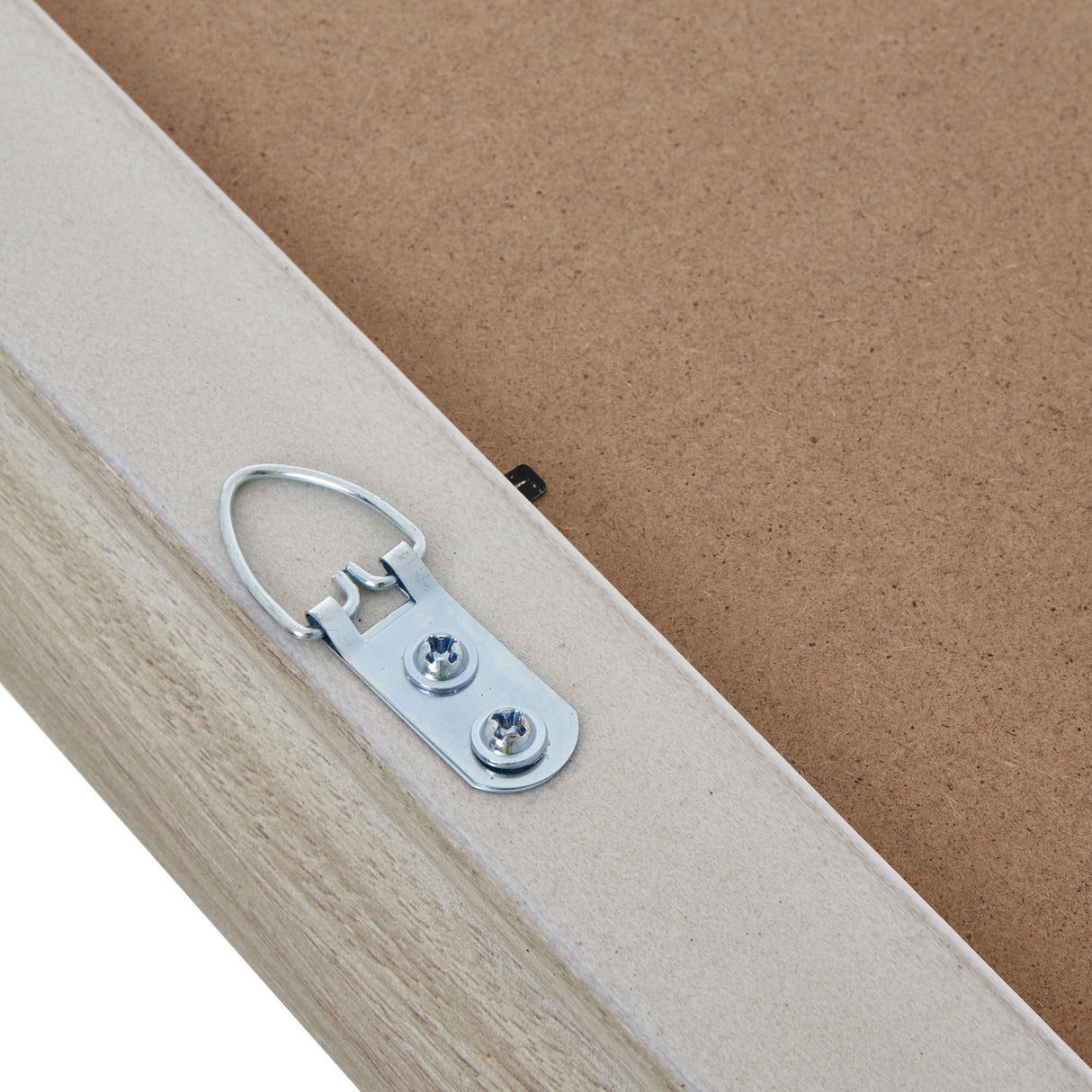 Close-up of the Hill Interiors White Washed Wooden A2 Picture Frame corner showing the metal D-ring hanger screwed to the pale wood backing.
