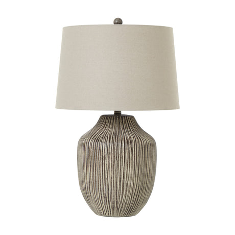 Hill Interiors Ochre Textured Table Lamp with a carved ribbed resin base in ochre-brown and a tapered natural linen shade, on a white background.