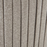 Close-up of the Hill Interiors Swivel Ottoman's oatmeal twill upholstery, showing the vertical ribbed panels and softly textured cream woven fabric.