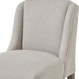 Close-up of the Hill Interiors Braxdon Aspen Wooden Dining Chair showing the light neutral upholstered seat and gently sloping backrest.