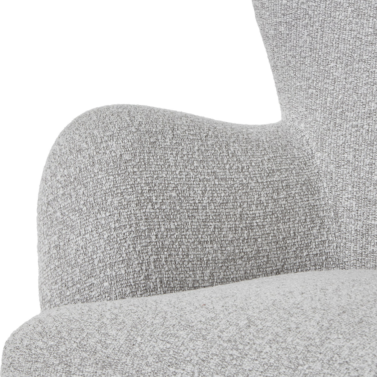 Close-up of the Hill Interiors Large Arm Accent Chair showing the curved upholstered backrest and seat in textured greige-beige woven fabric.