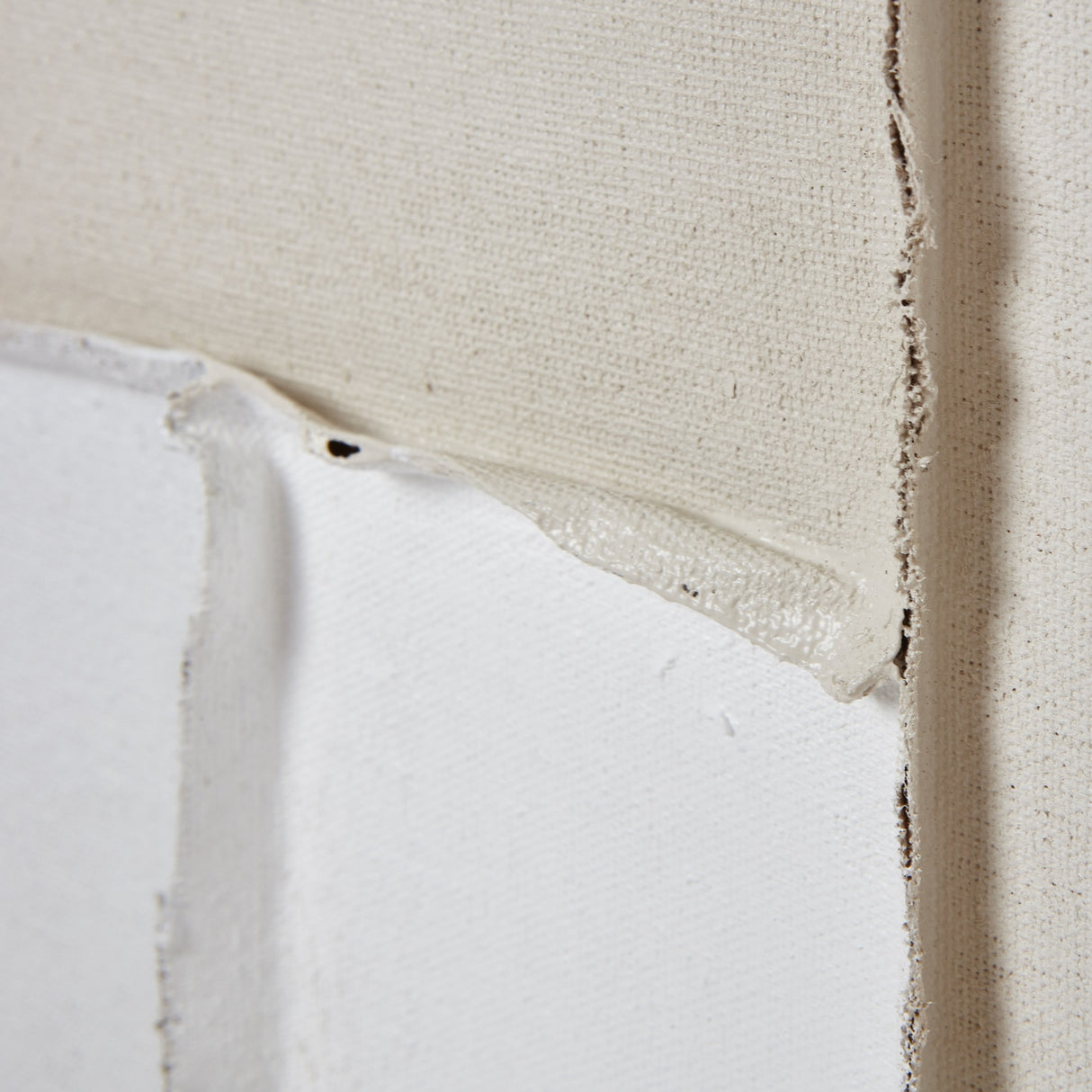 Close-up of the Hill Interiors Beta Framed Canvas Painting showing the stretched cream canvas edge and solid wood frame corner detail.