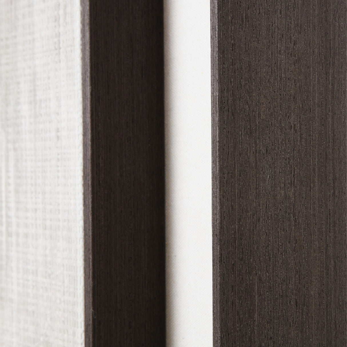 Close-up detail of the Hill Interiors Extra Large Painting on Linen showing the natural woven linen surface set against the solid brown wood frame edge.