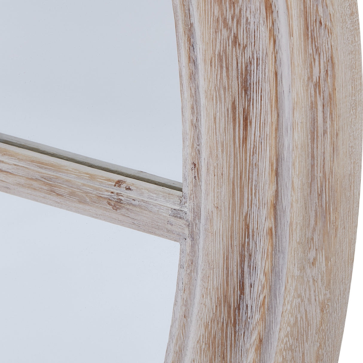 Close-up of Hill Interiors Washed Wood Framed Round Mirror in brown, showing the visible grain and matte washed finish along the curved timber edge.