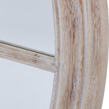 Close-up of Hill Interiors Washed Wood Framed Round Mirror in brown, showing the visible grain and matte washed finish along the curved timber edge.