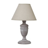 Hill Interiors Urn Table Lamp with turned wooden base in white painted finish and natural linen tapered shade, shown on a plain white background.