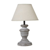 Hill Interiors Urn Table Lamp with turned grey wooden base and natural linen tapered shade, shown on a plain white background.