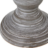 Close-up of the turned wooden base of the Hill Interiors Urn Table Lamp in soft grey, showing ribbed detailing and natural grain on a white background.