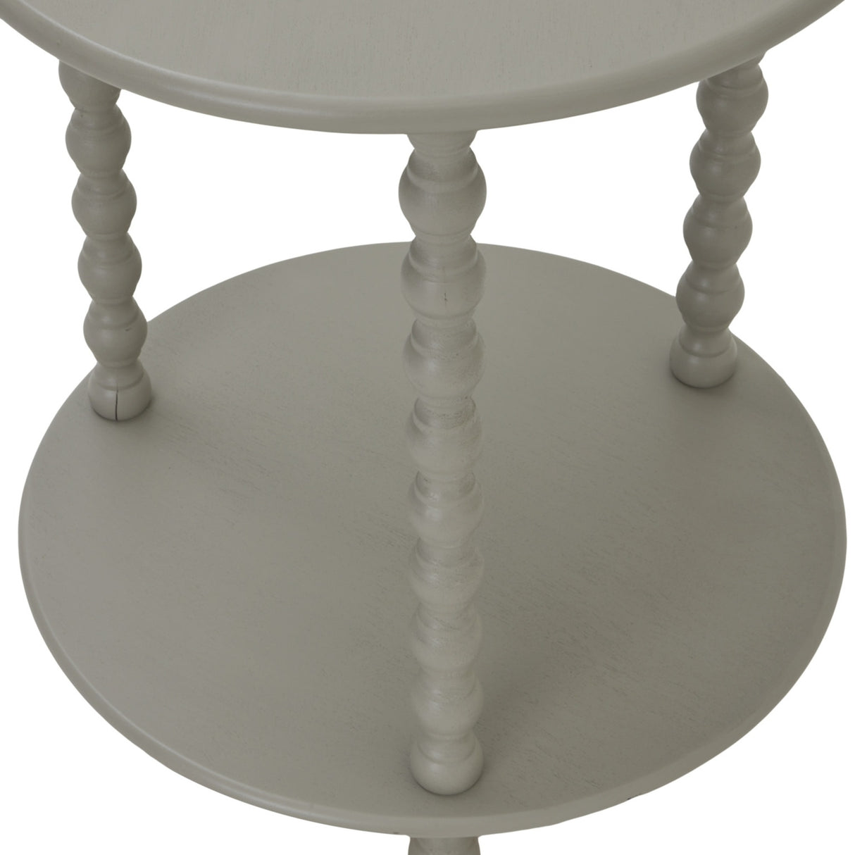Close-up of Hill Interiors Round Wooden Side Table in grey, showing turned bobbin legs supporting the circular top and lower shelf.