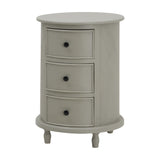 Hill Interiors 3 Drawer Round Side Table in grey wood with three bow-front drawers, black knobs and turned feet, shown on a plain background.