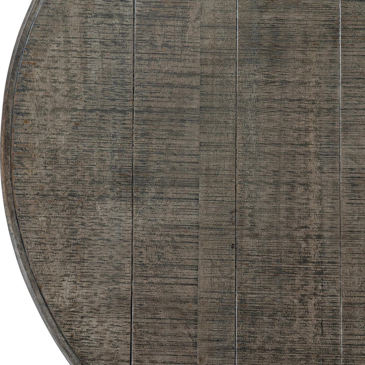 Close-up of the Hill Interiors Round Wooden Dining Table in brown, showing the plank-effect tabletop with visible grain and rustic weathered finish.