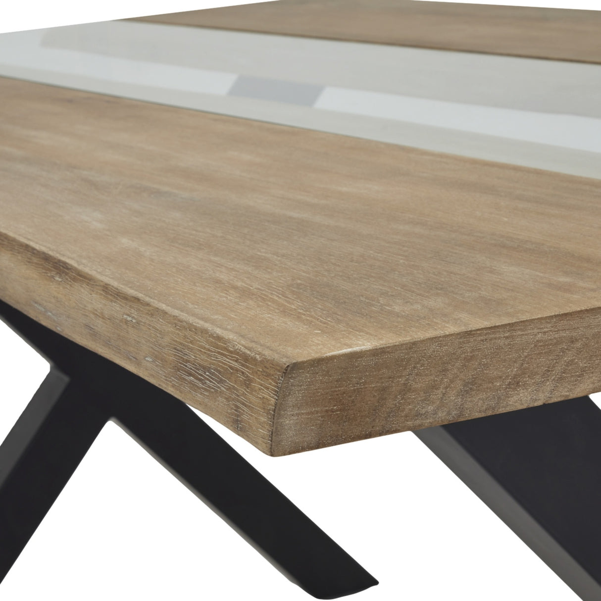 Close-up of Hill Interiors Live Edge Acacia River dining table showing honeyed wood grain, tapered black metal leg and pale central inlay.