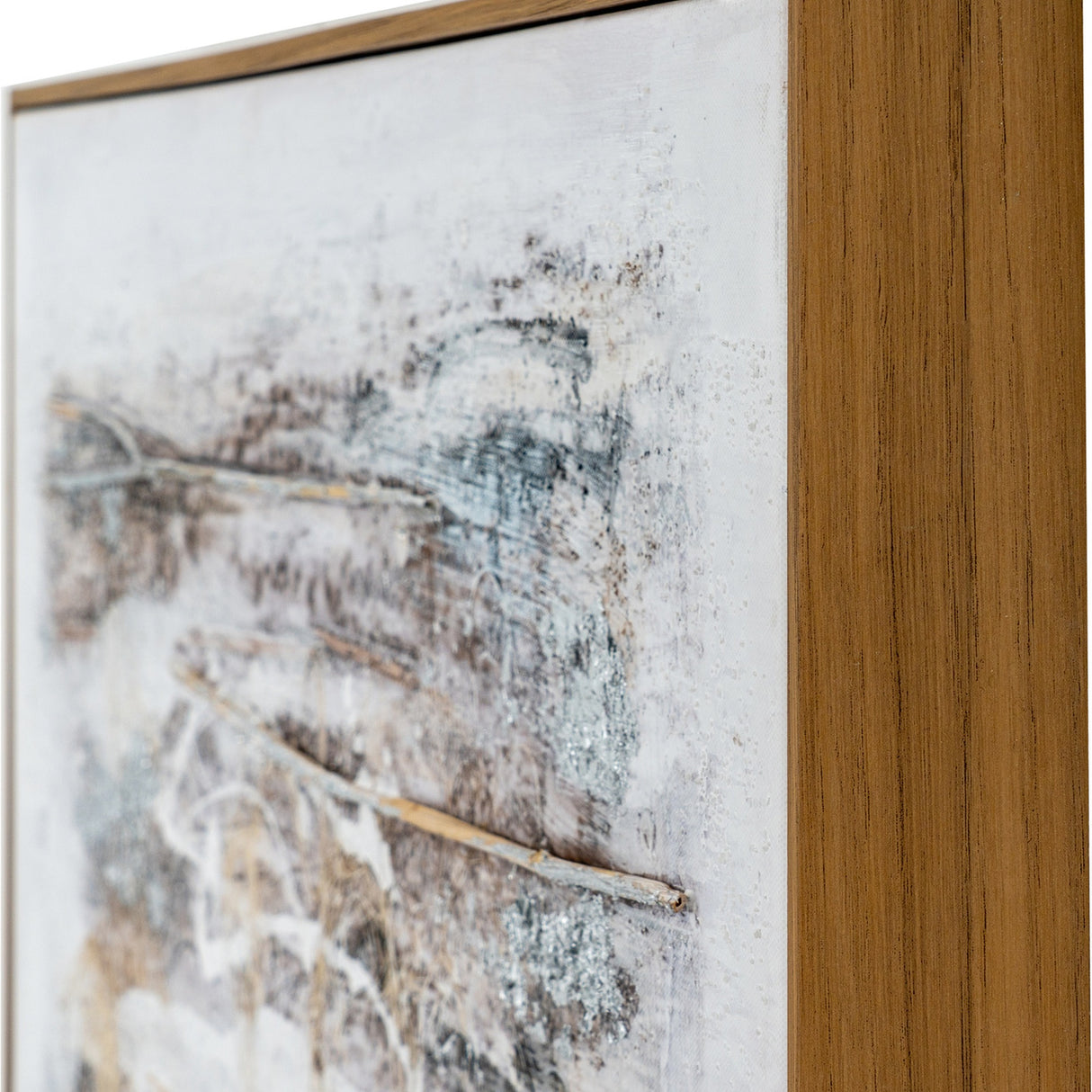 Close-up corner detail of Hill Interiors hand painted canvas wall art showing textured brown and cream brushwork with twig accents in a slim wooden frame.
