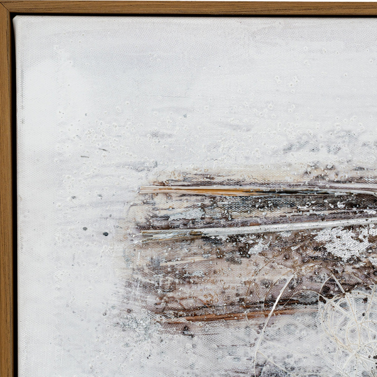 Close-up corner detail of Hill Interiors hand painted canvas wall art showing brown and cream brushed tones with textured layering, set in a slim wooden frame.
