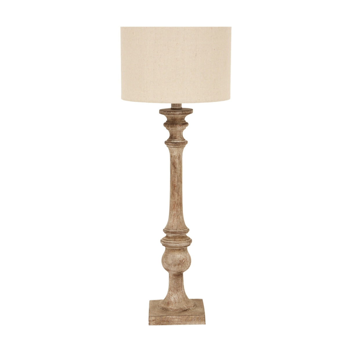 Hill Interiors candlestick table lamp with a turned brown resin base and natural linen drum shade, shown against a plain white background.
