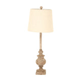 Hill Interiors candlestick table lamp with turned brown resin base and natural linen tapered shade, shown on a plain white background.