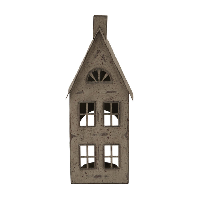 Hill Interiors tall rustic metal house tealight holder in brown, with pitched roof, chimney, arched attic window and cut-out panes, on a white background.